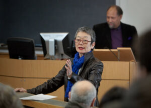 Michiko Okaya speaks in a classroom