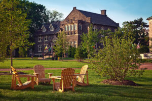 Four Adirondack chairs on the Quad at Lafayette College