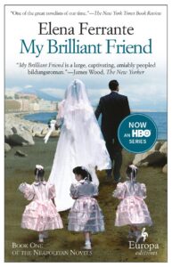 A bride and groom walk outside with three young children following them, serving as the cover of the book My Brilliant Friend.
