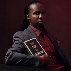 Ibram Kendi holds a copy of his book How to be an Antiracist.