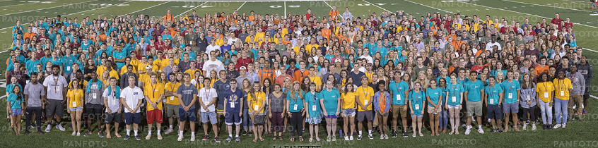 Students from the Class of 2021 gather on Fisher Field for a group photo.