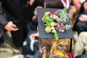 A Commencement cap with flowers on it