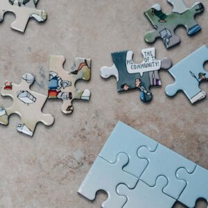 Jigsaw puzzle pieces, some loose and some connected