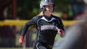 A Lafayette softball player runs on the basepath during a game.