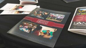 A Landis Center brochure featuring Lafayette students working with children in the community