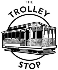 Image of Trolley Stop diner logo which features an old trolley car inside a circle with a name around it