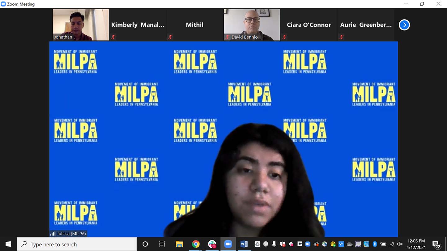 Julissa Morales speaks over Zoom with a backdrop that promotes Movement of Immigrant Leaders in Pennsylvania (MILPA).