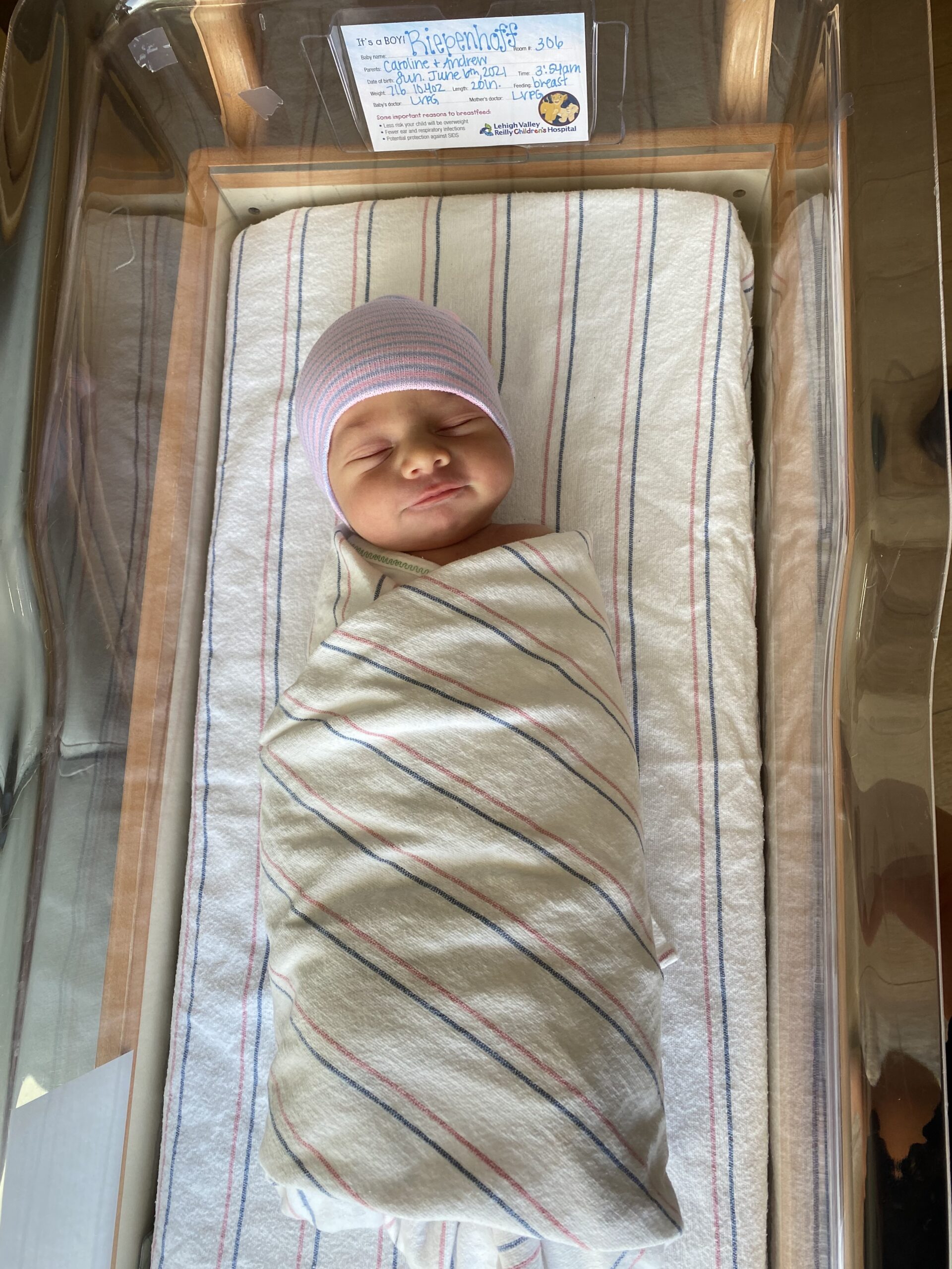 Baby Jay Riepenhoff Foster wrapped in a blanket in his hospital crib shortly after birth