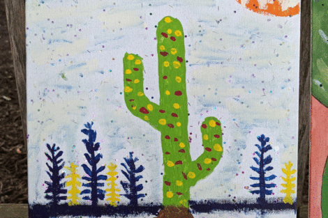 A painting of a cactus amid other plants