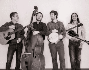 The four members of bluegrass band Serene Green with their instruments