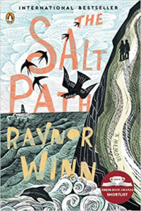 The cover of the book The Salt Path, featuring an illustration of a couple walking on a path by the sea, with a dolphin in the water and several birds above