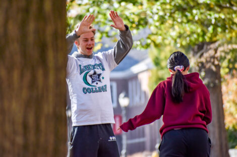 Participants cheer each other on during the Pards Against Sexual Assault Take Back the Night 5K kickoff event