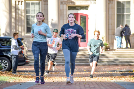 Participants run in the Take Back the Night 5K kickoff event for Pards Against Sexual Assault (PASA), Nov. 2021