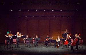 Jorge Torres performs with students in the Marquis Consort on the Williams Center stage in 2011.