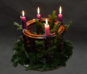 advent wreath with lit candles