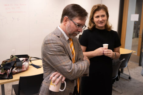 Provost Meier and President Hurd sample coffee during Professor Joseph Woo’s FYS143 Coffee Showcase.