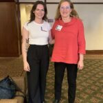 Prof. Andrea Smith and Emily Mulford '15 posing together at Cornell conference