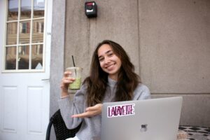 Sofia Ruggiero ‘26, Economics major, studies outside Mojo 516 Cafe.