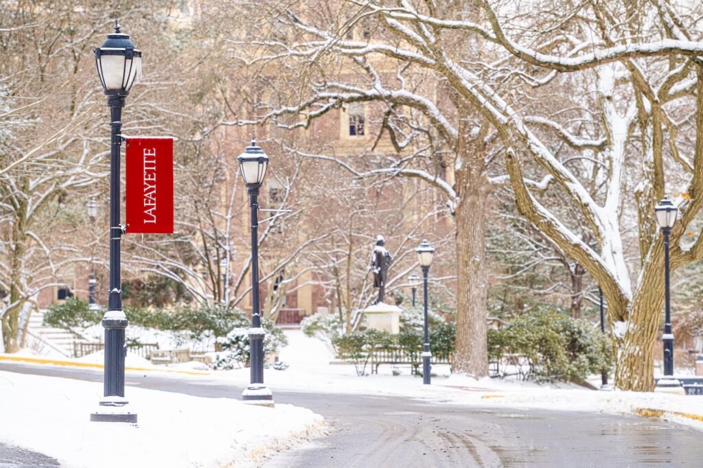 A snowy path is shown from campus.