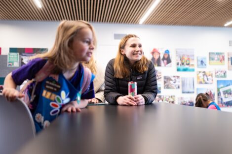 A Lafayette Engineering student works with a local Girl Scout at a table in Acopian during Girl Scout Badge Day.