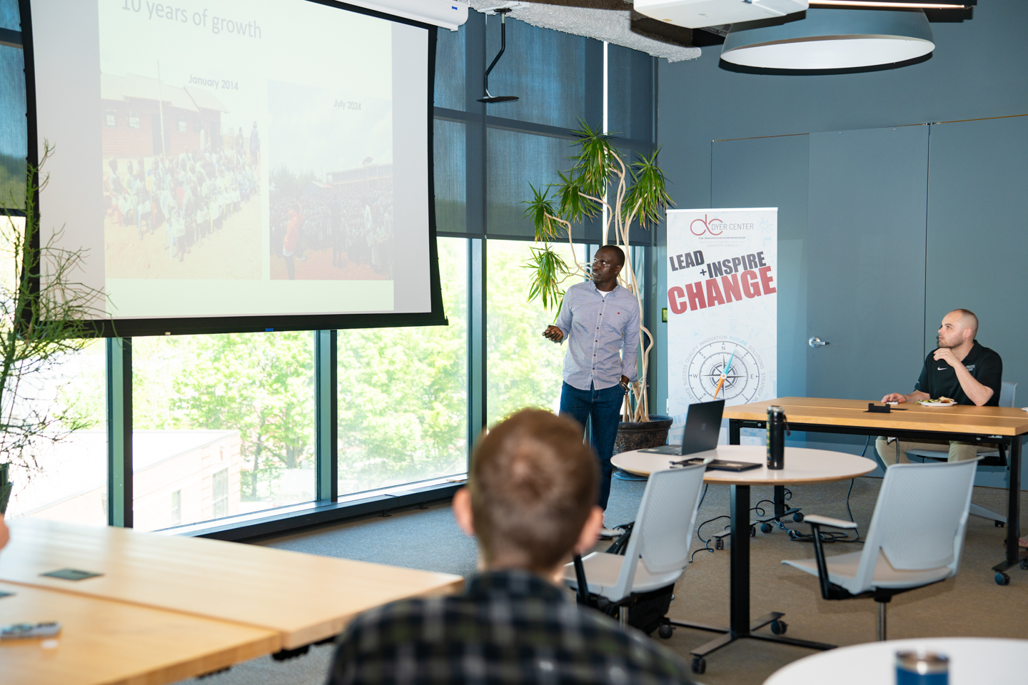 Kelvin Serem '17, founder of Blair-Serem School, speaking as a presenter, sharing his story.