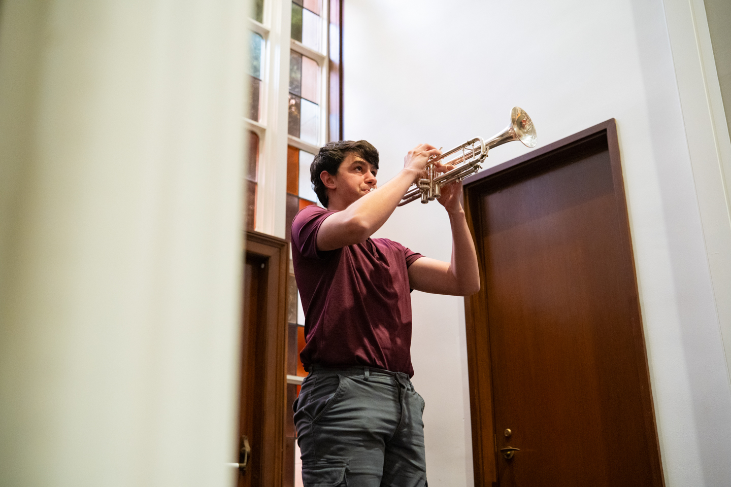 Cory Stein playing bugle calls on the trumpet, opening the Aaron O. Hoff ceremony in tribute.