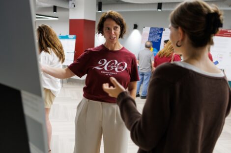 Meghan Masto, associate provost of scholarship, research, and academic initiatives is pictured at the poster display during Bicentennial Kickoff.