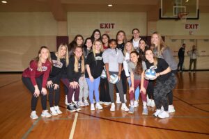 Group of Lafayette students posing at National Girls and Women in Sports Clinic